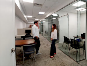 Thiago and Manuela in the office